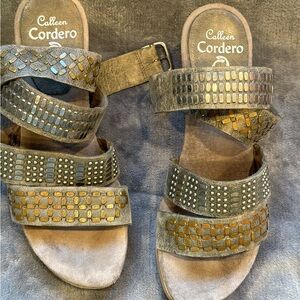 Calleen Cordero’s Y2k costal avant garde gray and silver studded leather sandals